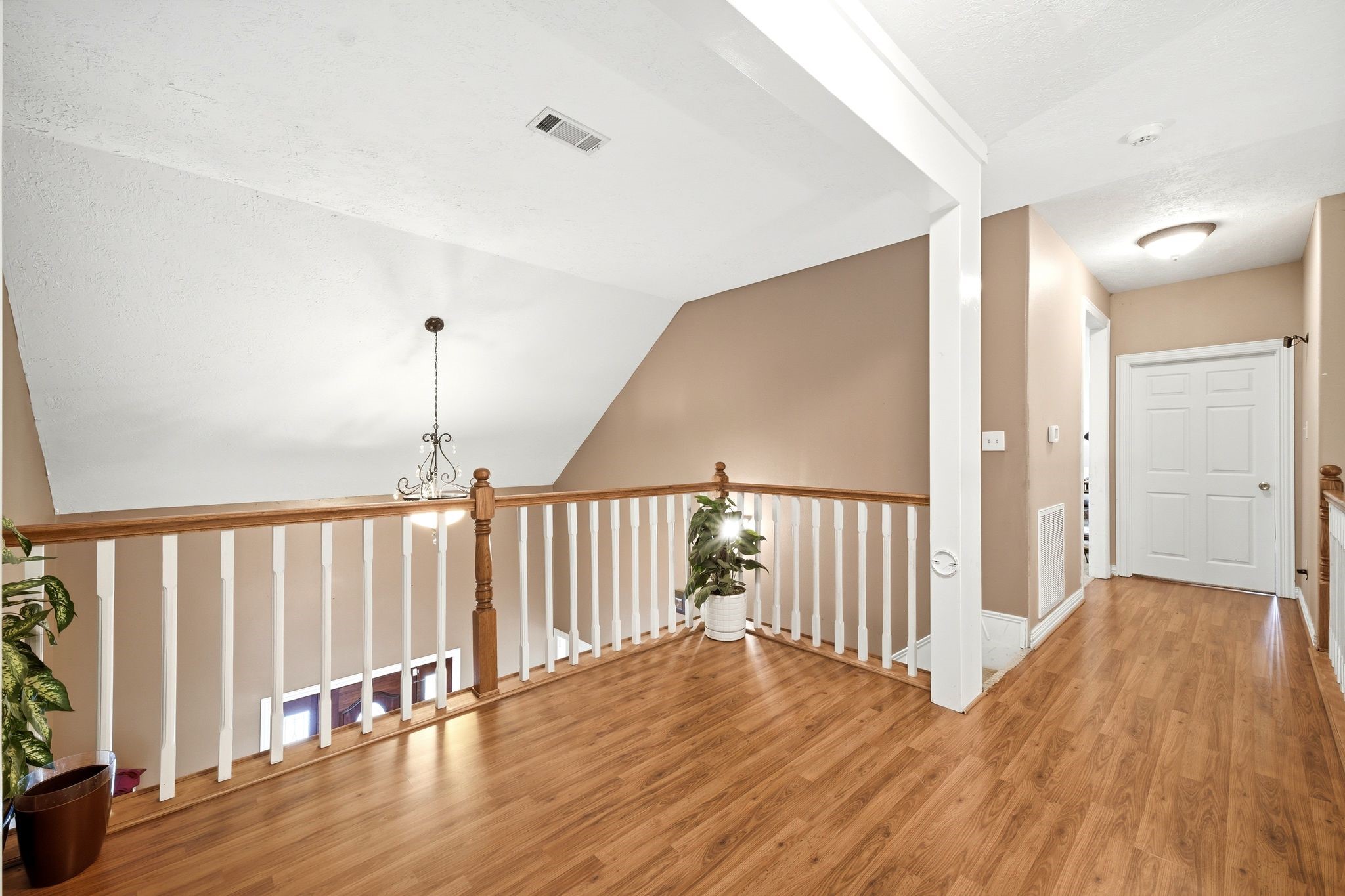 144 Wood Farm Road Huntsville, TX 77320 - Photo 26 of 50 a view of a hallway with wooden floor