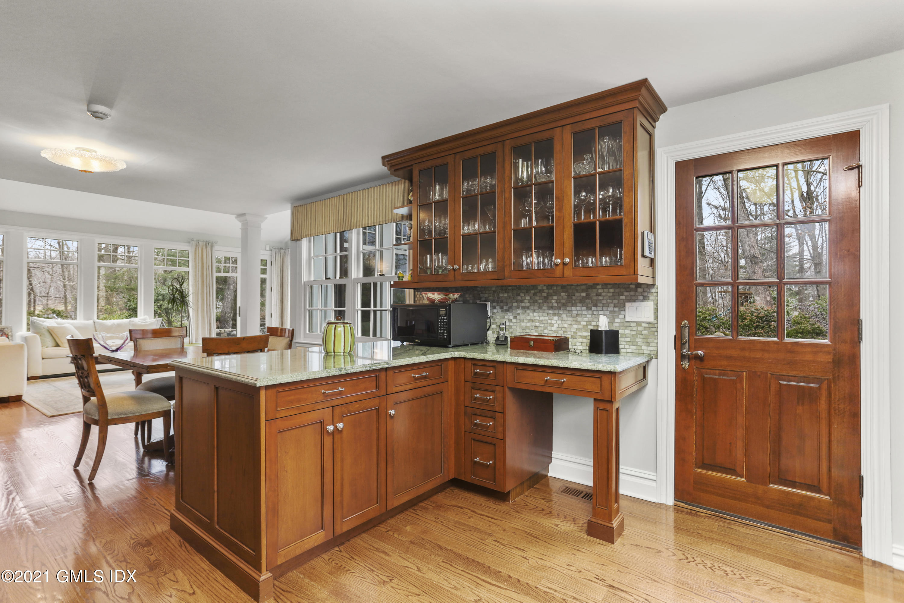 265 Riversville Road Greenwich, CT 06831 - Photo 11 of 47 a kitchen with stainless steel appliances granite countertop a stove and cabinets