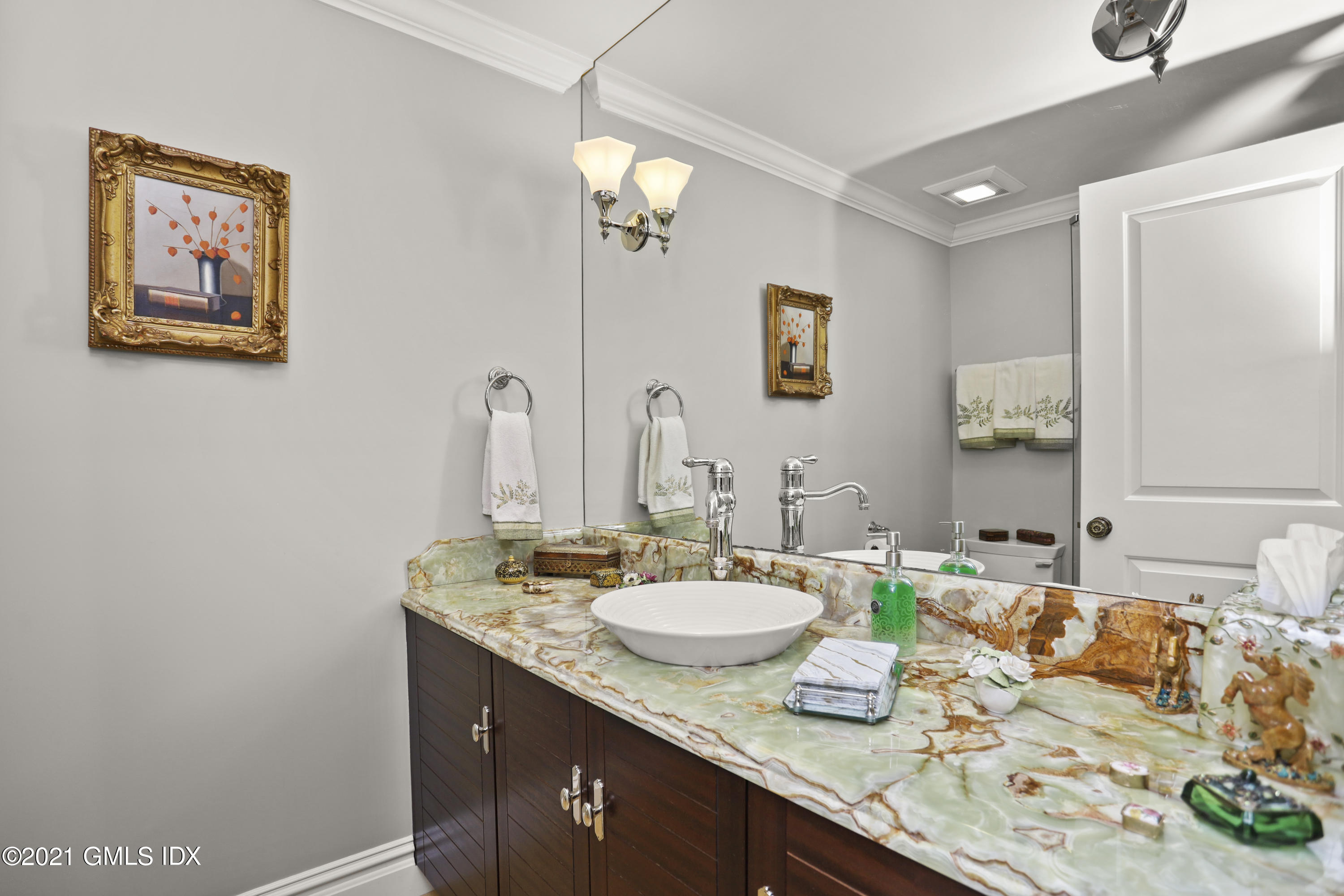 265 Riversville Road Greenwich, CT 06831 - Photo 22 of 47 a bathroom with a granite countertop sink and a mirror