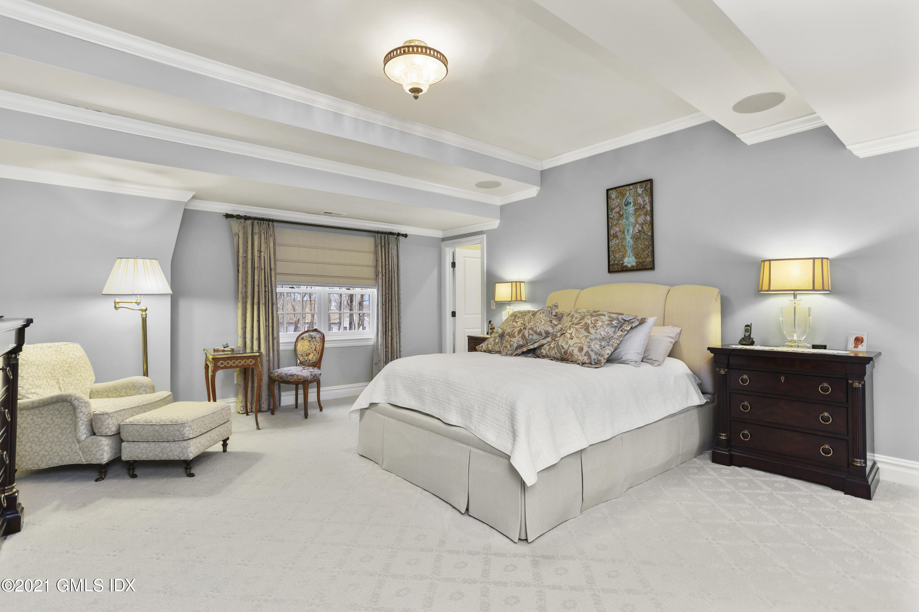 265 Riversville Road Greenwich, CT 06831 - Photo 23 of 47 a spacious bedroom with a bed and window