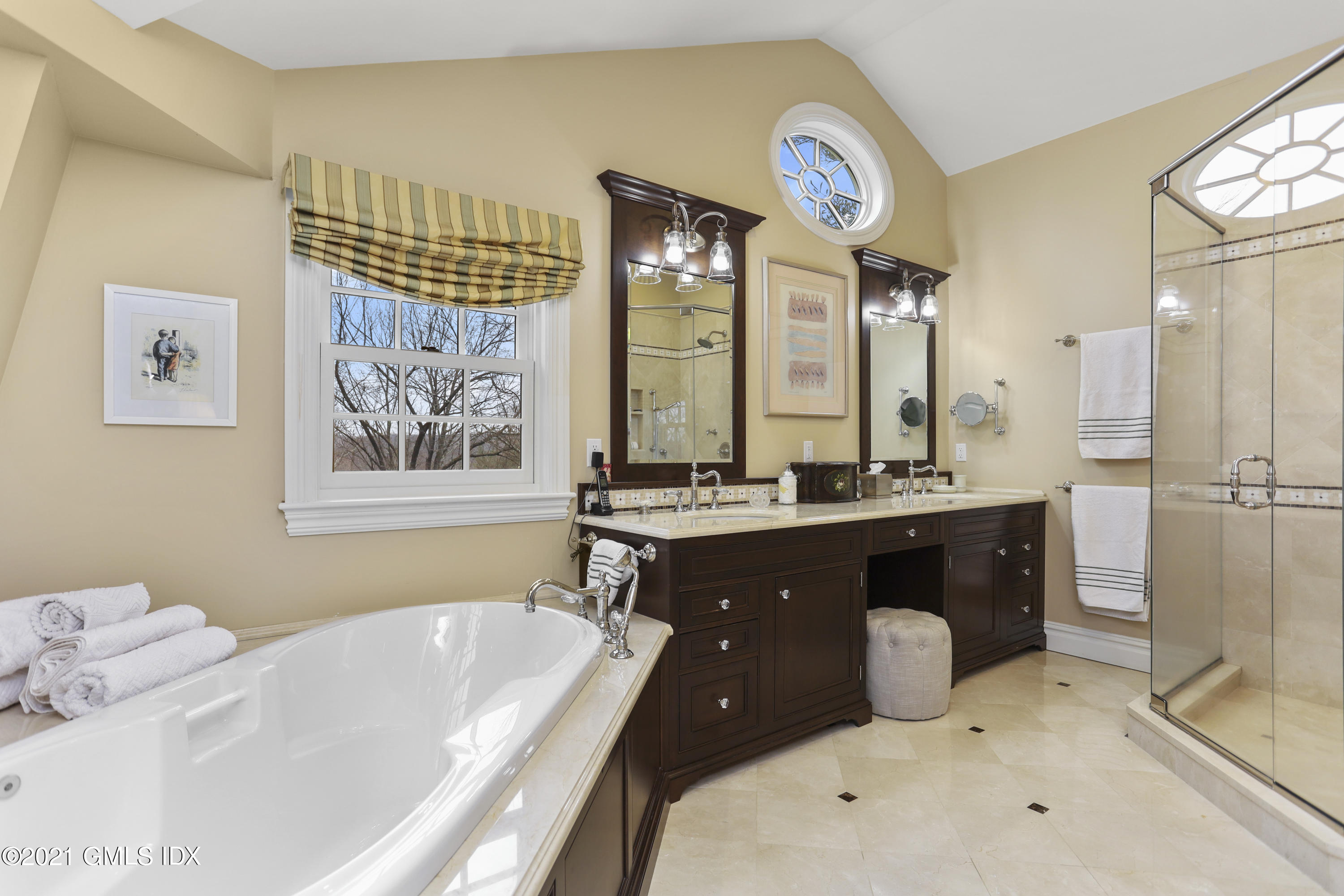 265 Riversville Road Greenwich, CT 06831 - Photo 27 of 47 a bathroom with a tub sink and mirror