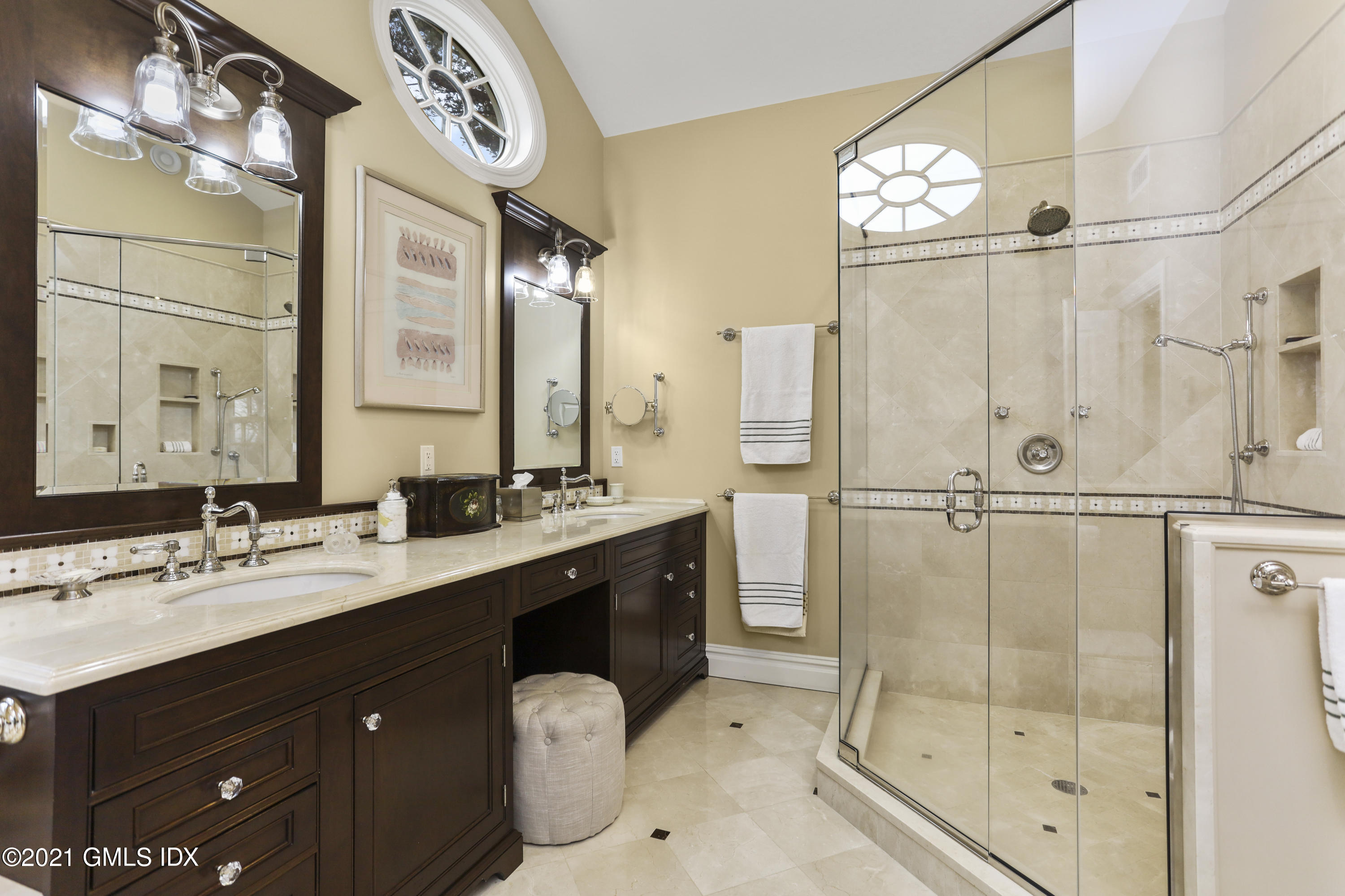265 Riversville Road Greenwich, CT 06831 - Photo 29 of 47 a bathroom with a double vanity sink mirror and shower