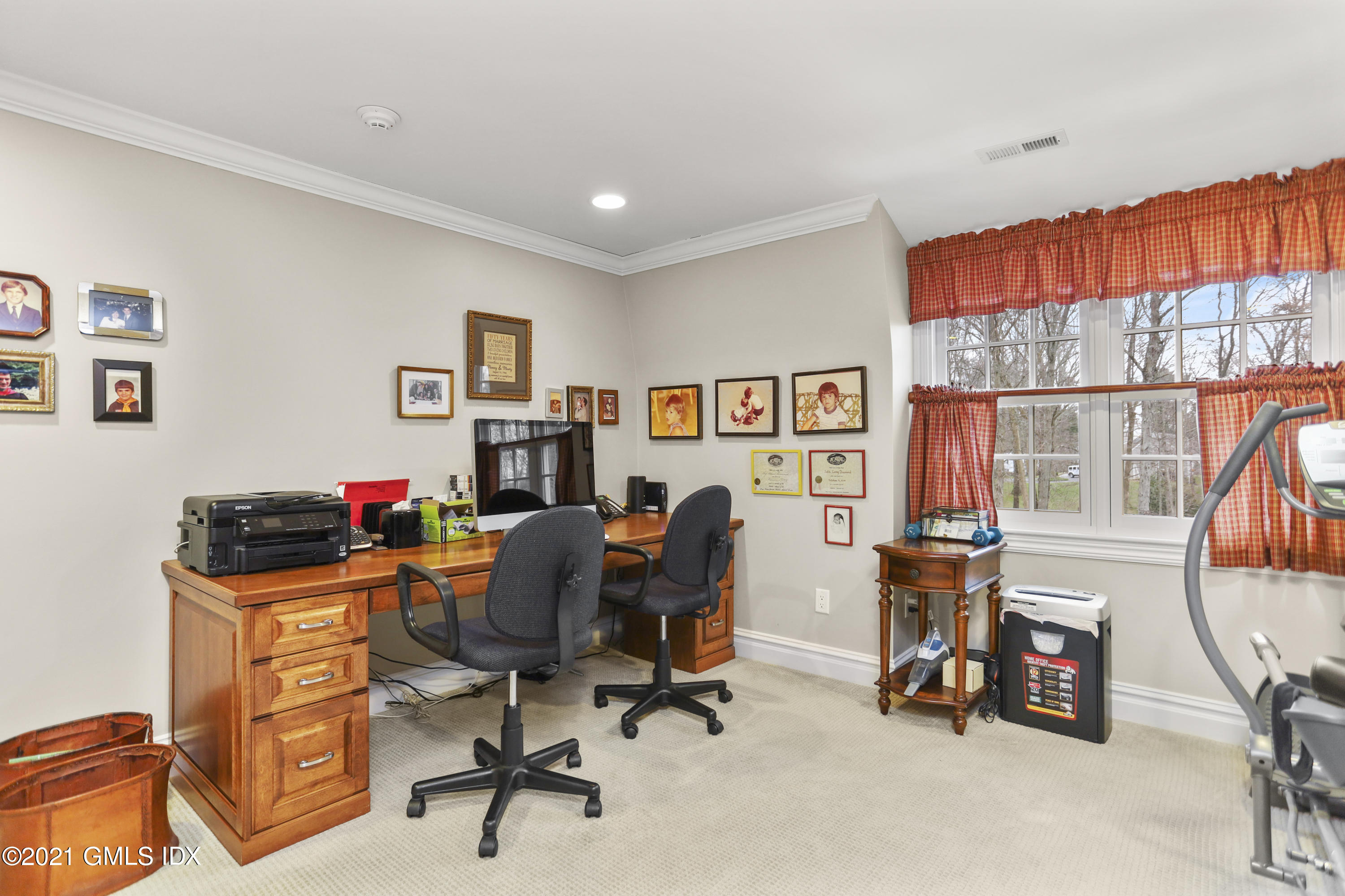 265 Riversville Road Greenwich, CT 06831 - Photo 31 of 47 a view of a workspace with furniture and a window