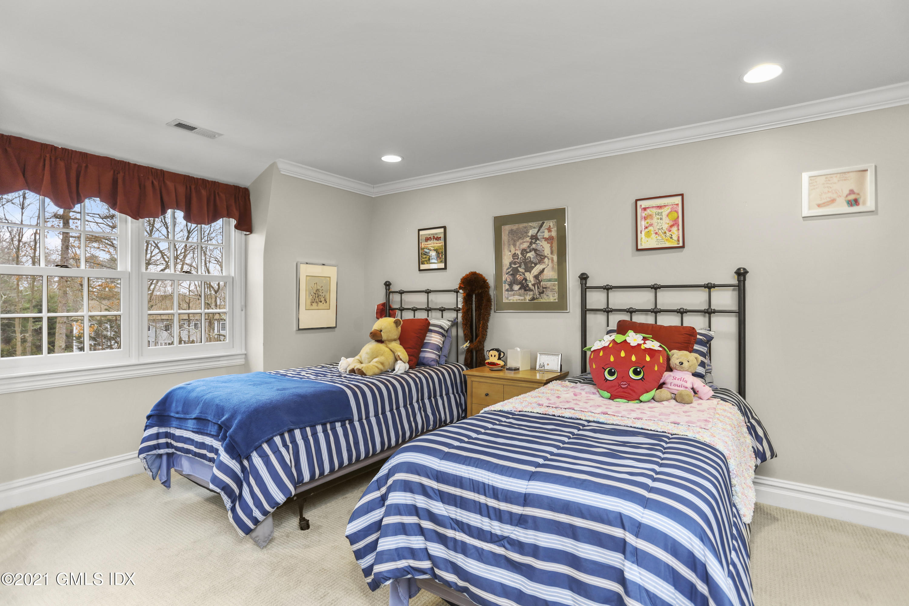 265 Riversville Road Greenwich, CT 06831 - Photo 33 of 47 a bedroom with two beds and a large window