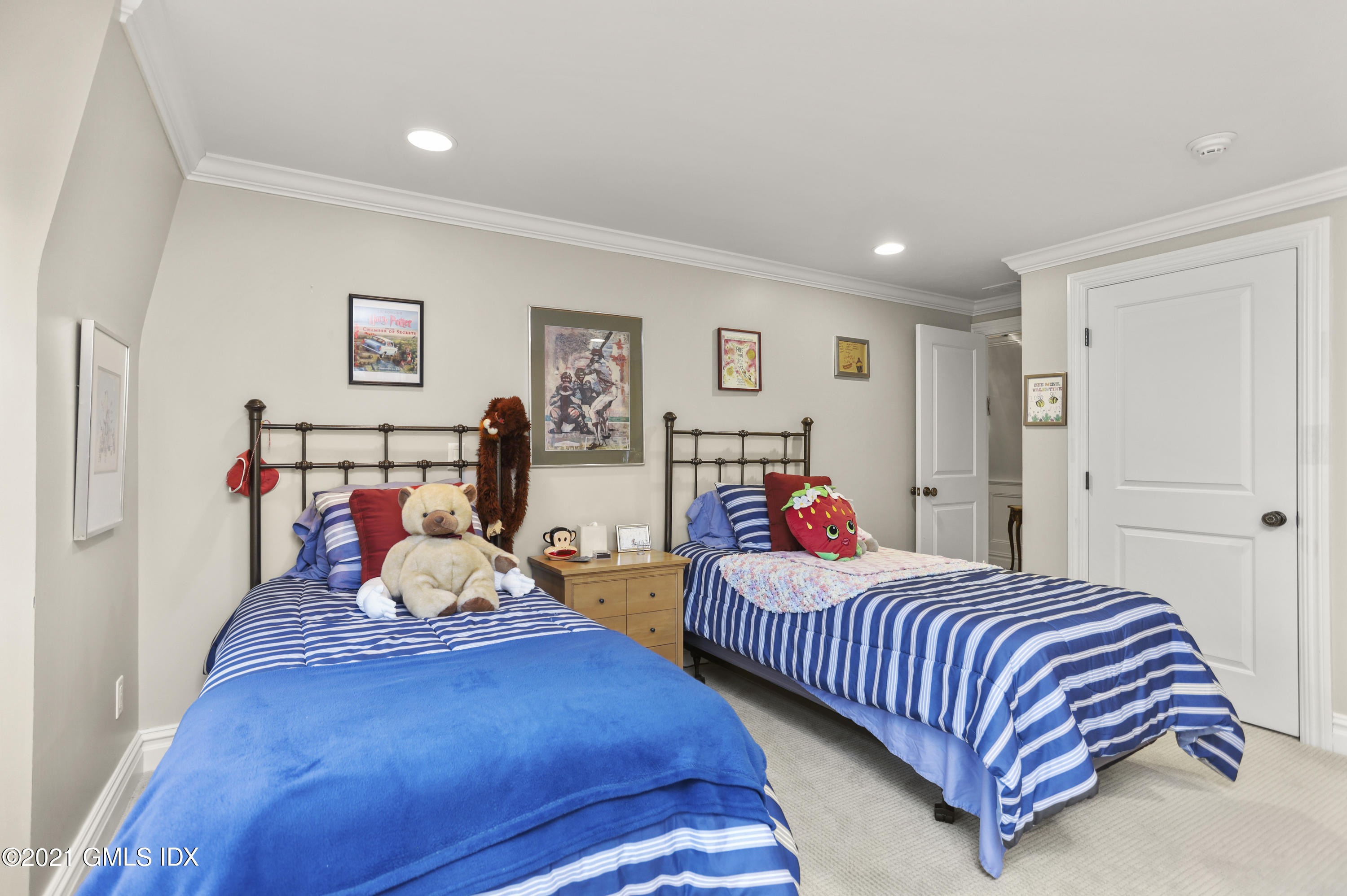 265 Riversville Road Greenwich, CT 06831 - Photo 34 of 47 a bedroom with two beds and a window