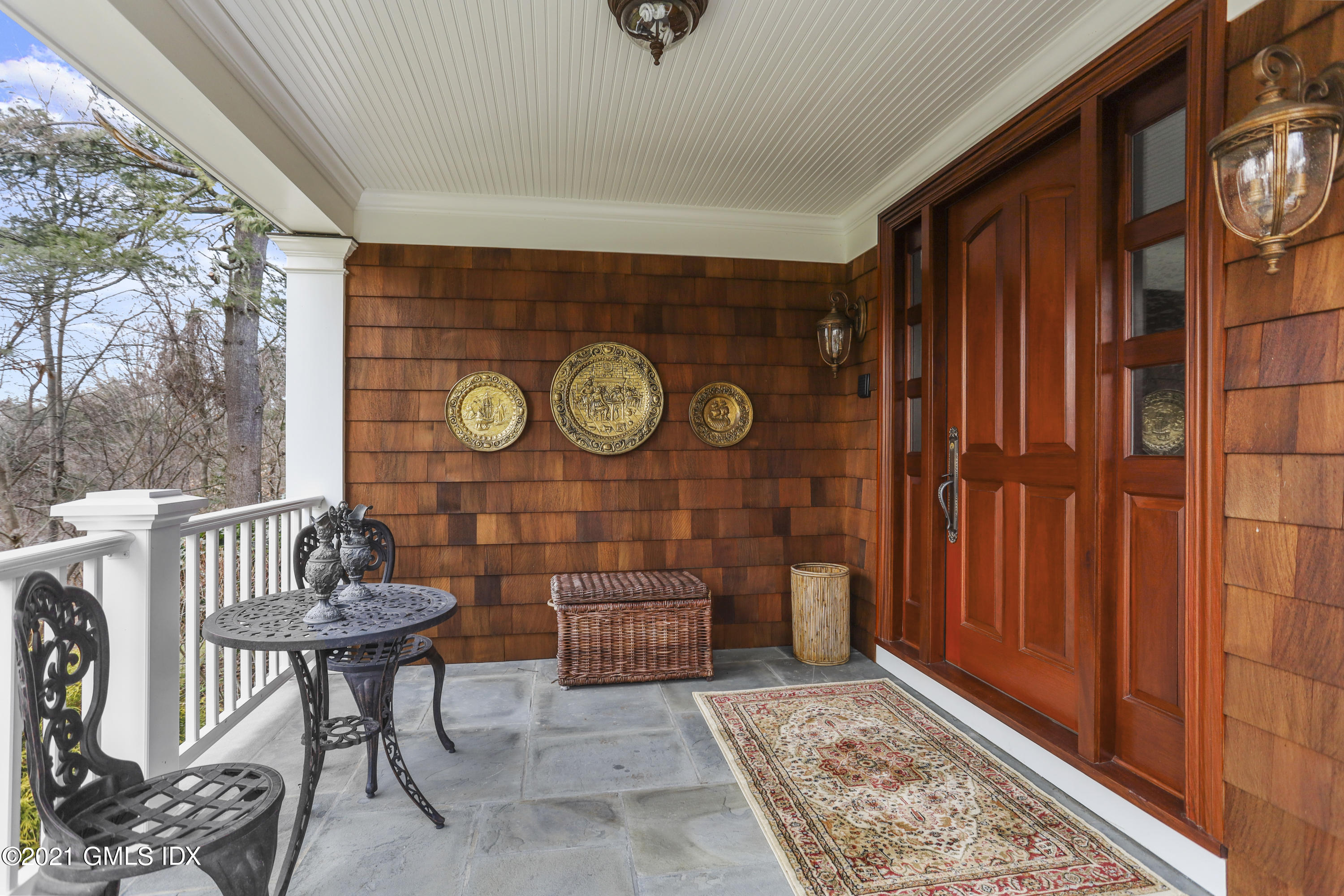 265 Riversville Road Greenwich, CT 06831 - Photo 4 of 47 a view of a chairs and table in a livingroom
