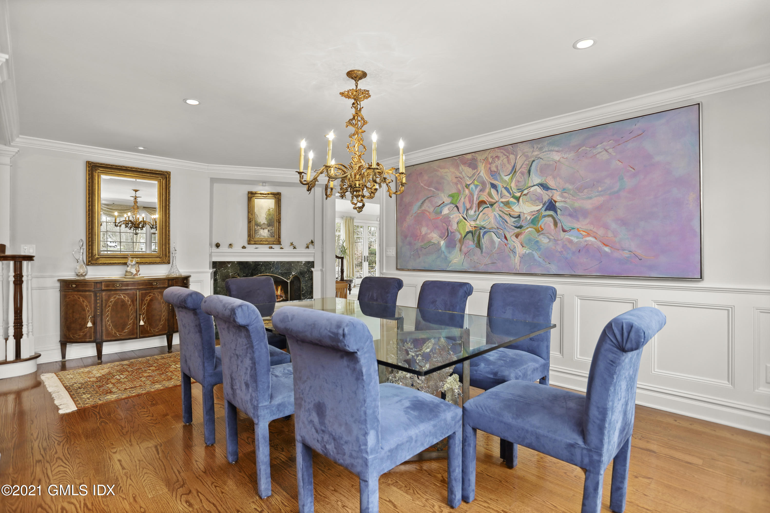 265 Riversville Road Greenwich, CT 06831 - Photo 9 of 47 a view of a dining room with furniture a chandelier and wooden floor