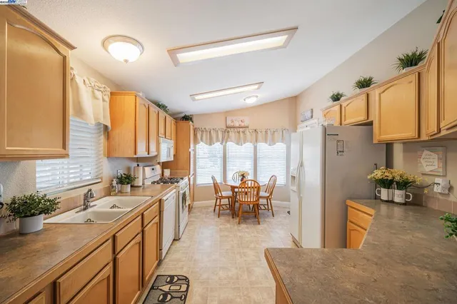 a very nice looking dining room with a large window