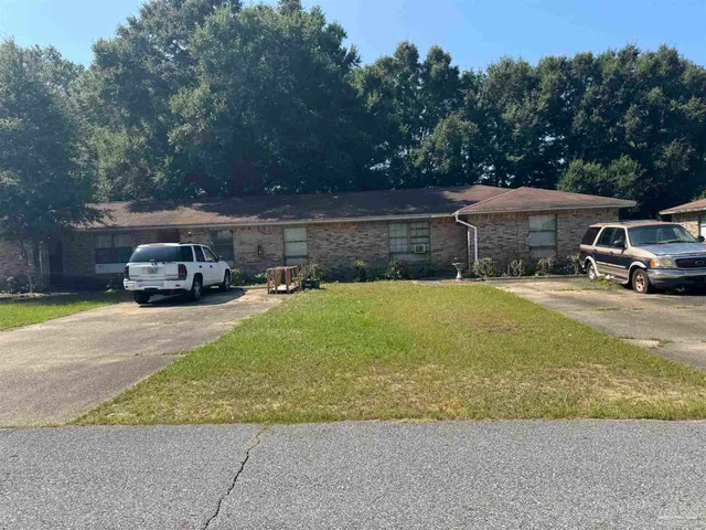 a car parked in front of a house