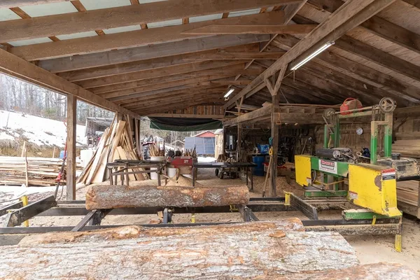 a view of a car park with furniture