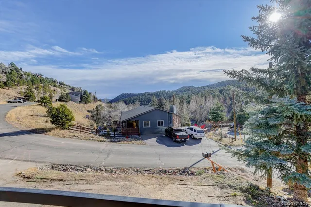$925,000 | 3203 Buckboard Drive, Evergreen, CO 80439