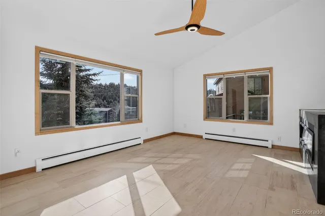 an empty room with windows