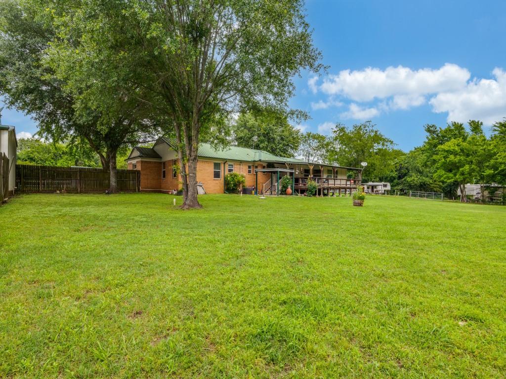 111 County Road 2806 Mabank, TX 75147 - Photo 23 of 40 a view of a house with a big yard