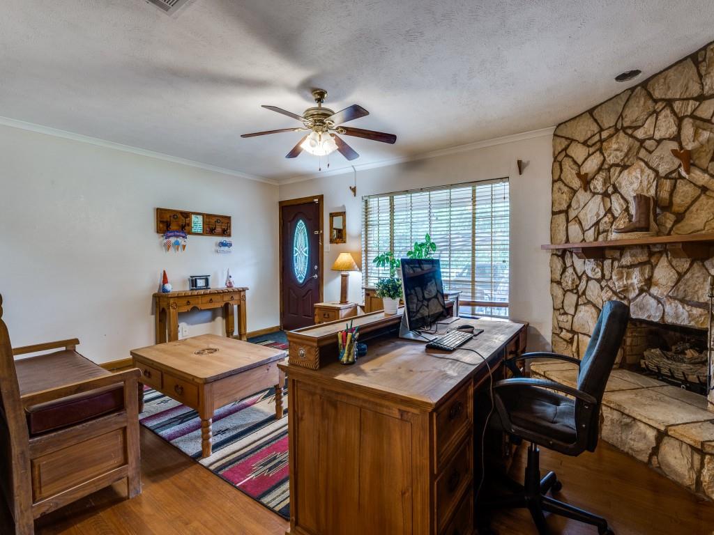 111 County Road 2806 Mabank, TX 75147 - Photo 26 of 40 a view of a workspace with furniture and a window