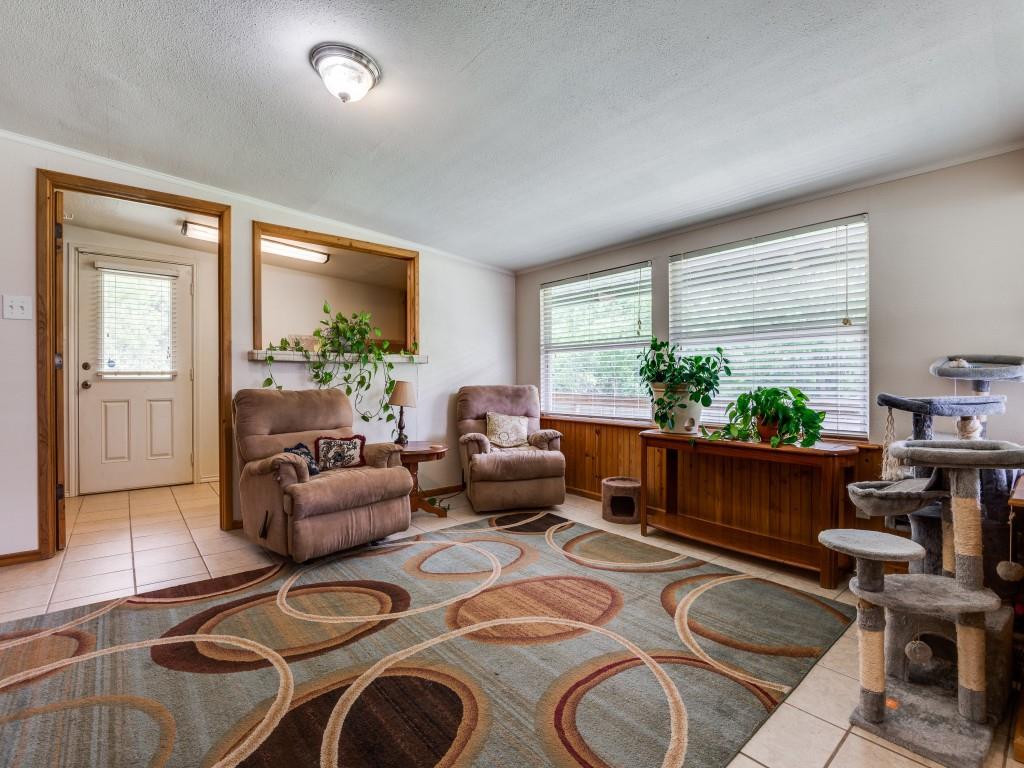 111 County Road 2806 Mabank, TX 75147 - Photo 33 of 40 a living room with furniture and a large window