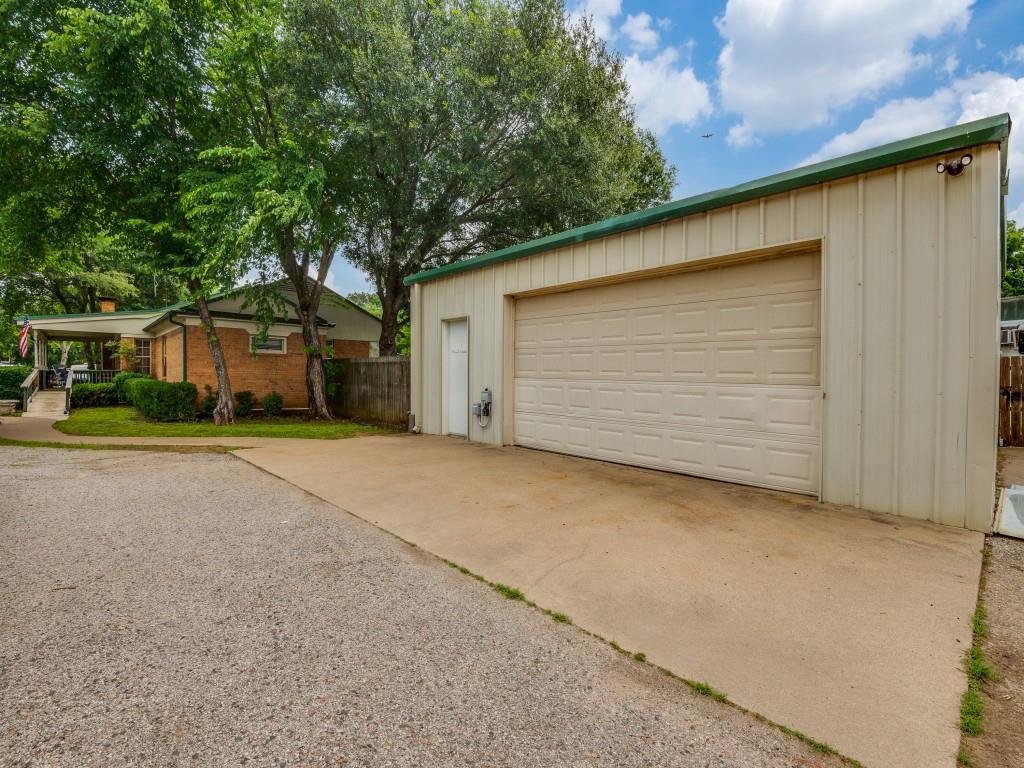 111 County Road 2806 Mabank, TX 75147 - Photo 39 of 40 a front view of house with yard and trees in the background
