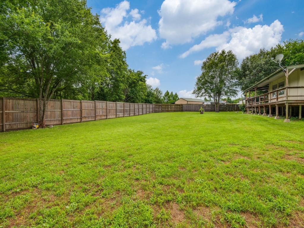 111 County Road 2806 Mabank, TX 75147 - Photo 40 of 40 a view of a yard with a house