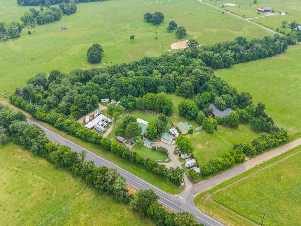 111 County Road 2806 Mabank, TX 75147 - Photo 4 of 40 a view of a garden with an outdoor space