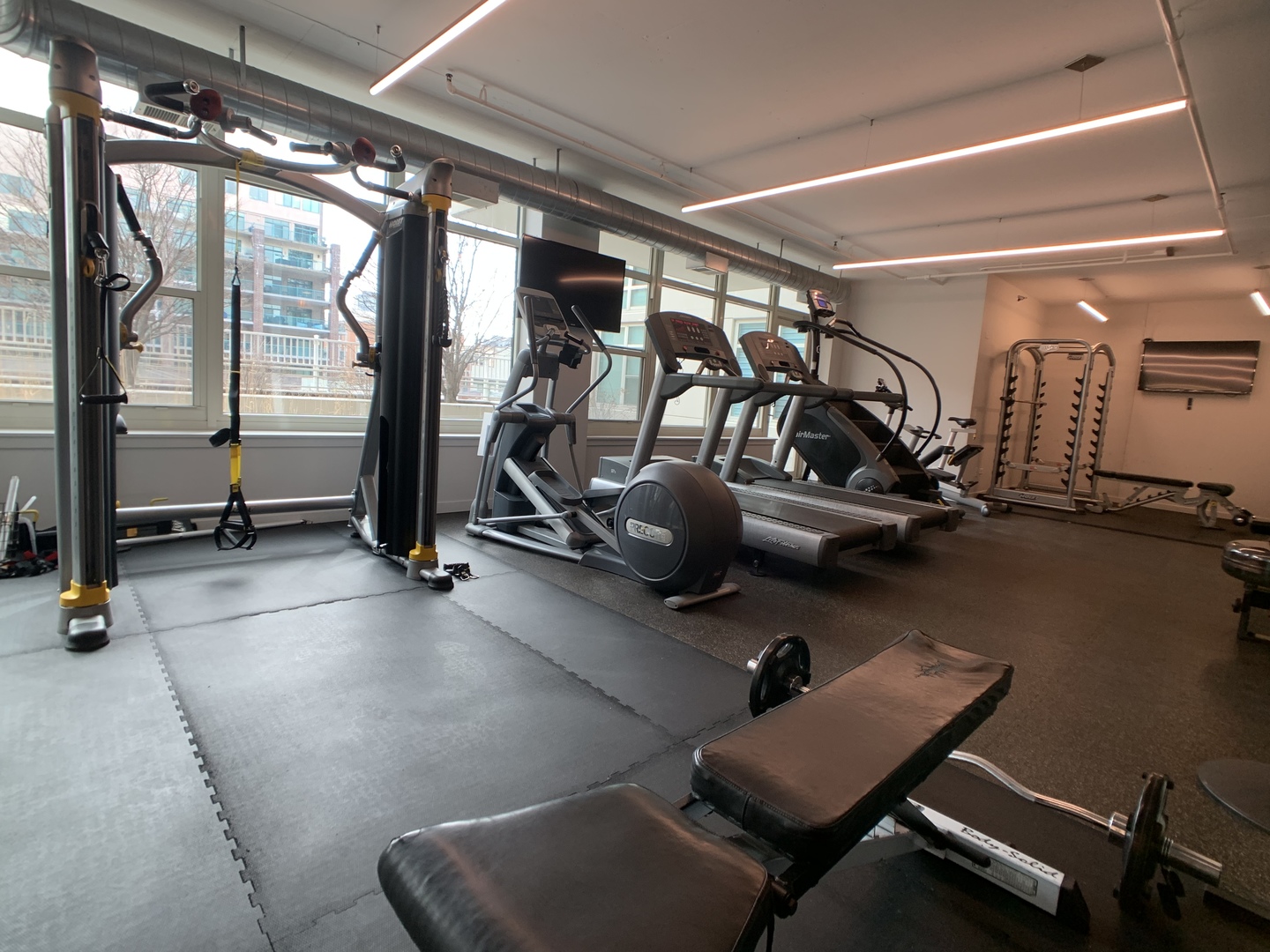 909 West Washington Boulevard, Unit 513 Chicago, IL 60607 - Photo 13 of 16 a view of a room with gym equipment