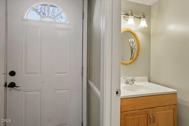 a utility room with sink dryer and washer