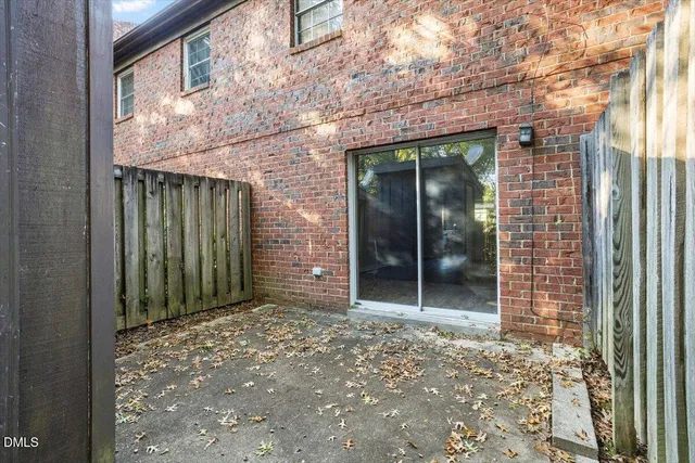 a outdoor living space with patio furniture and a potted plant
