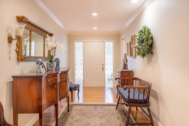a view of a livingroom with furniture and front door