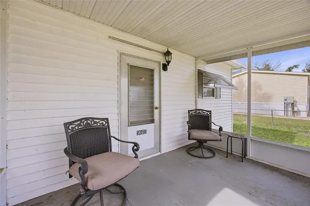 a view of a workspace with furniture