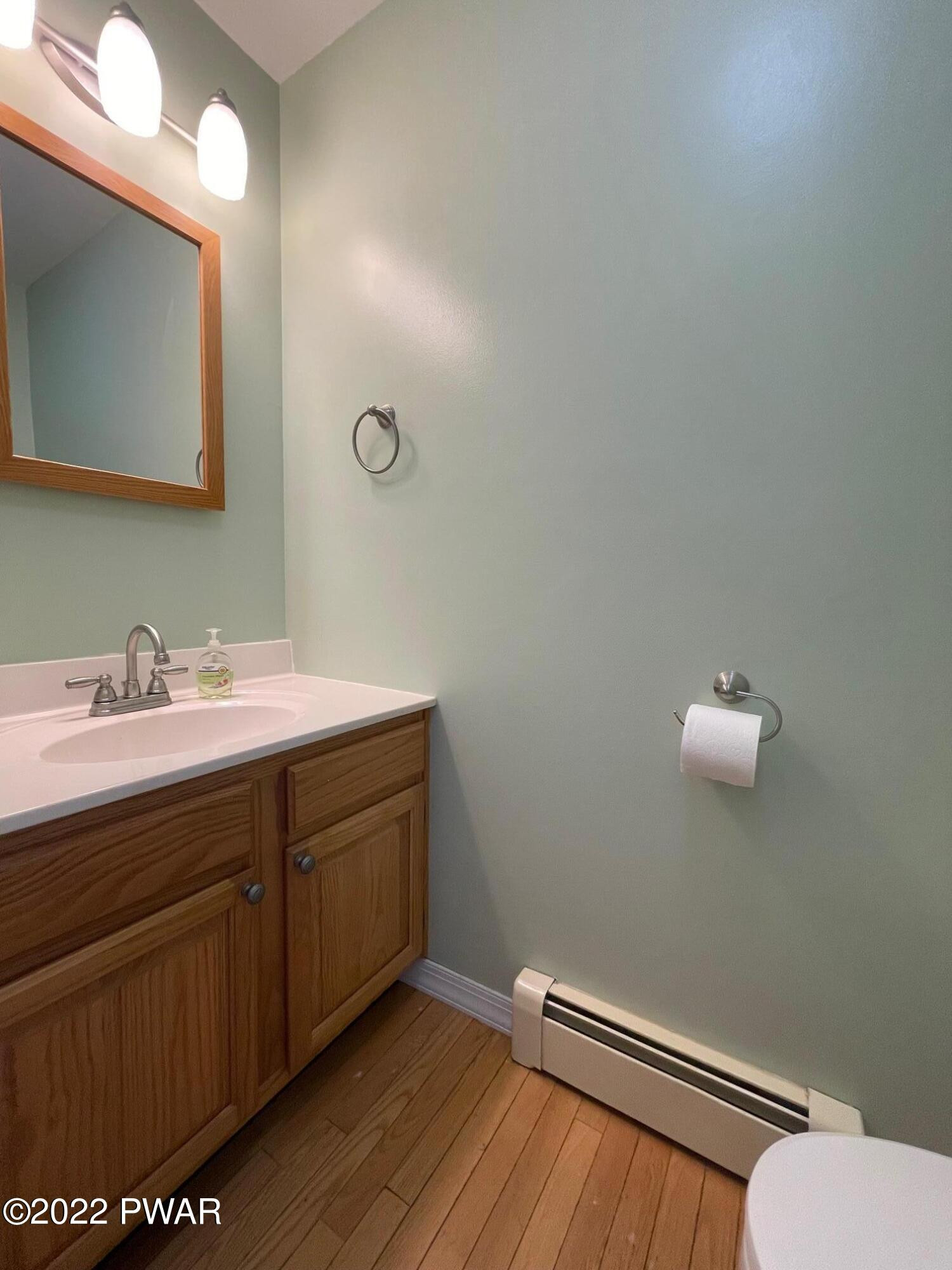 524 Creamton Drive Prompton, PA 18456 - Photo 23 of 57 a bathroom with a sink mirror and vanity