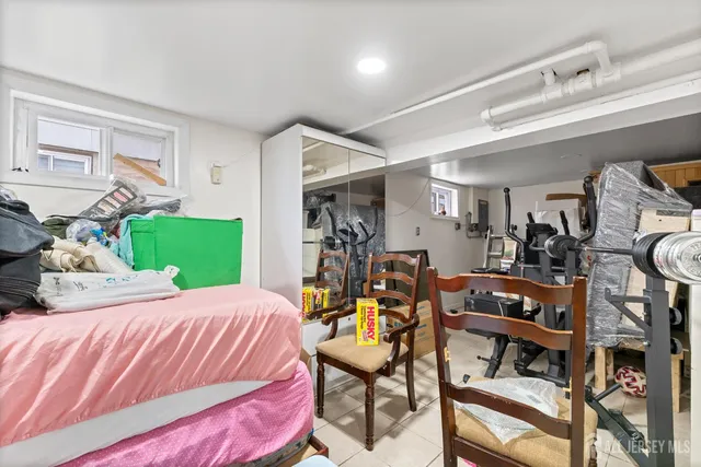 a bedroom with a bed and a table