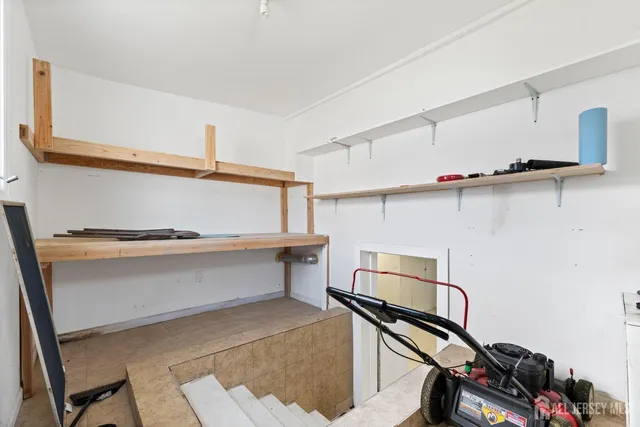 a view of room with cabinets