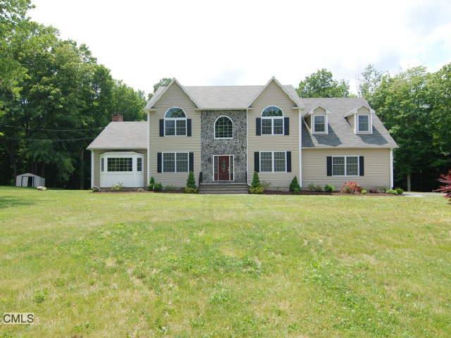 10 Mile Hill Road South Newtown, CT 06470 - Photo 1 of 1 a front view of a house with a garden