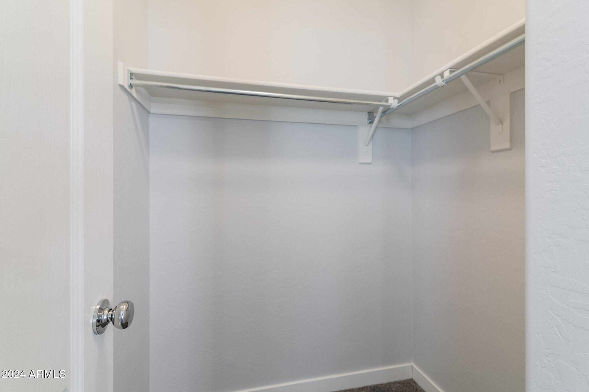 2066 South Martingale Road Gilbert, AZ 85295 - Photo 28 of 33 Third Bedroom Walk In Closet