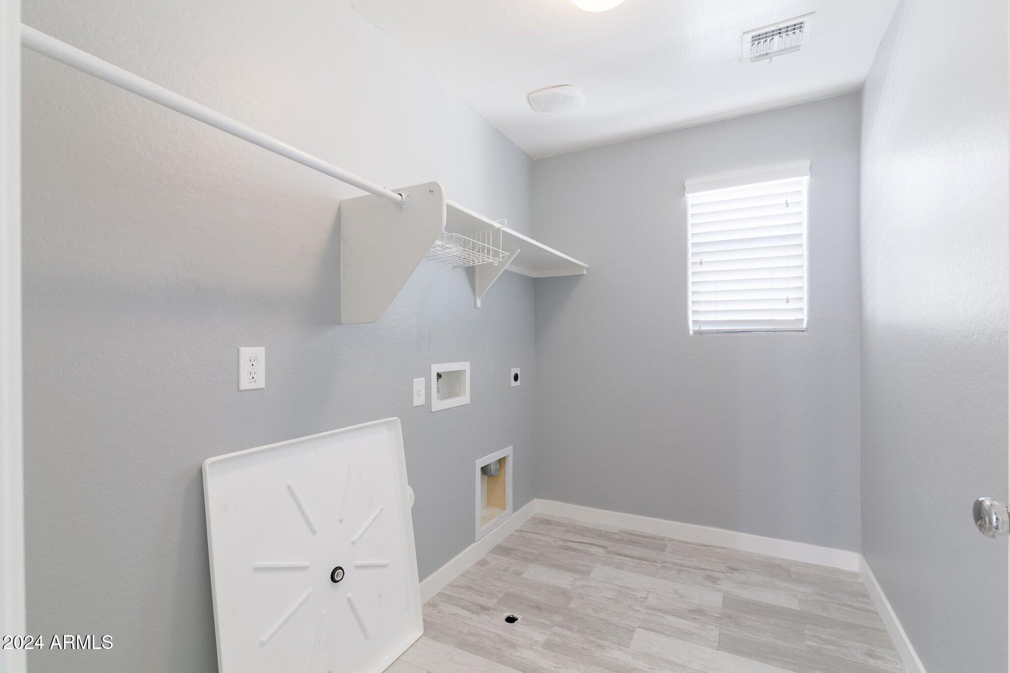 2066 South Martingale Road Gilbert, AZ 85295 - Photo 29 of 33 Laundry Room