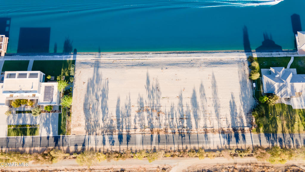 4600 Emerald Bay Drive Arvin, CA 93203 - Photo 2 of 11 a bathroom with a shower curtain and a sink