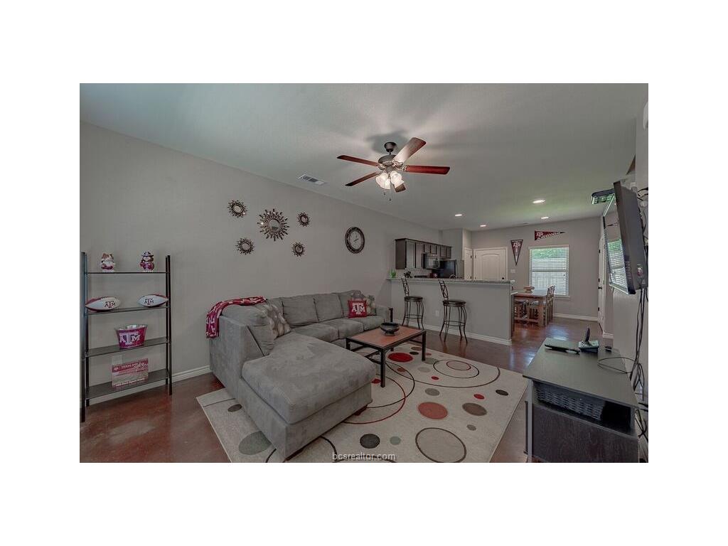 131 Watson Lane Bryan, TX 77801 - Photo 2 of 20 Living room with ceiling fan