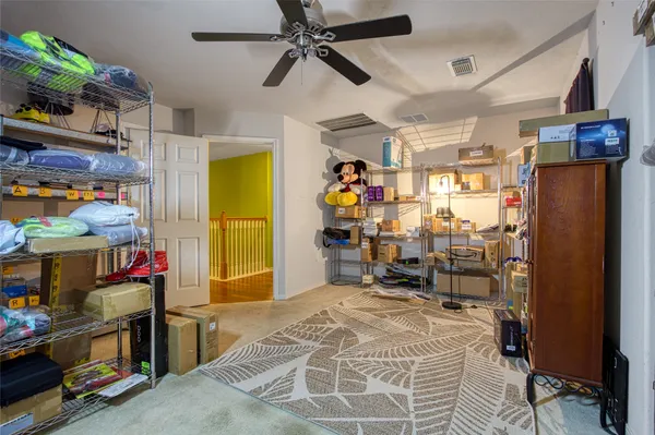 a storage room with washer and dryer