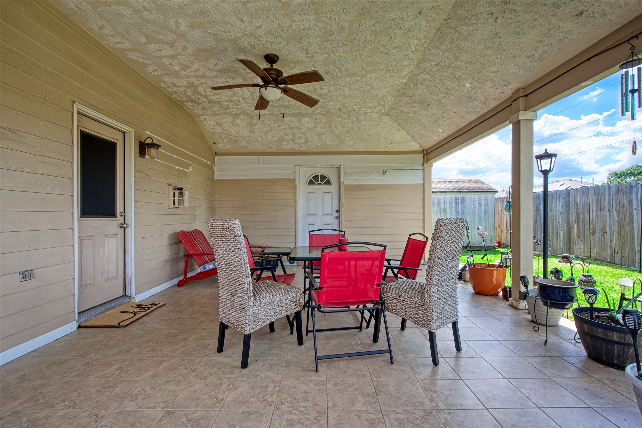 6702 Northridge Trace Lane Spring, TX 77379 - Photo 4 of 30 Private back patio with no back neighbors. Back door to the left, and guest suite entrance is in the center.