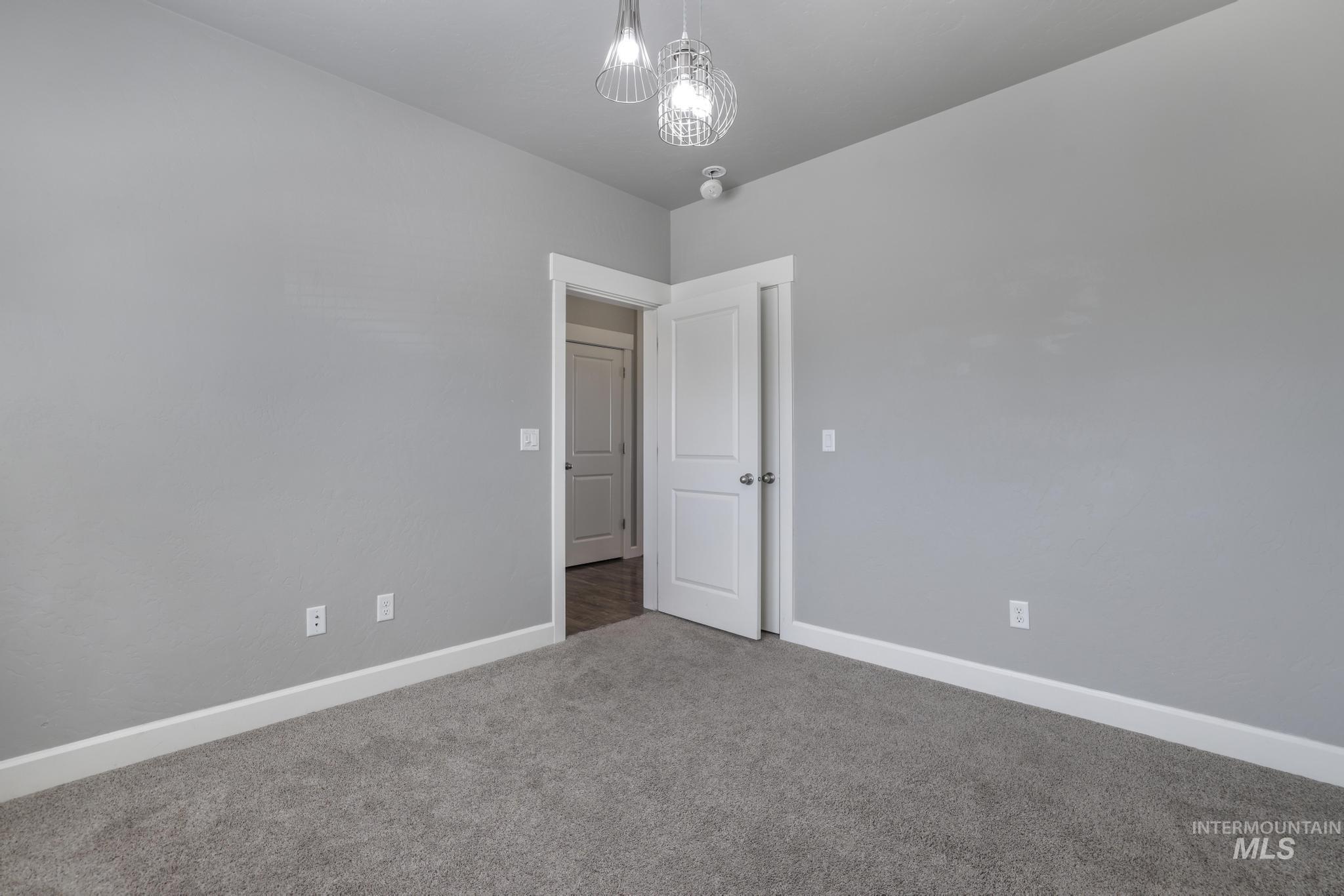 2858 Sunray Loop Twin Falls, ID 83301 - Photo 26 of 45 Empty room with baseboards and carpet