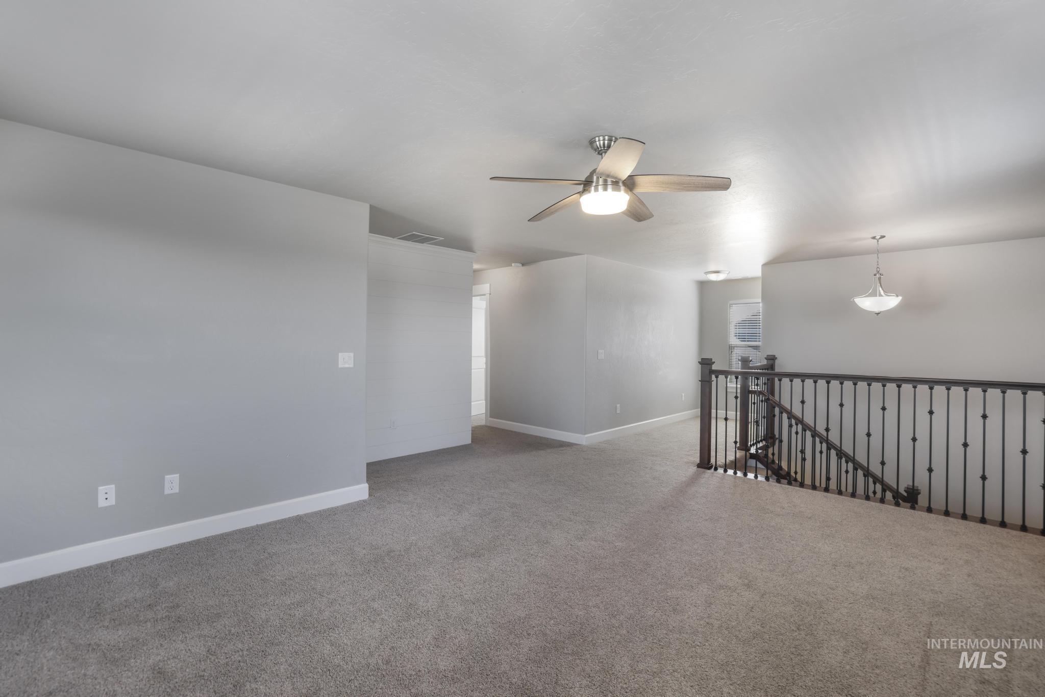 2858 Sunray Loop Twin Falls, ID 83301 - Photo 27 of 45 Unfurnished room with carpet floors and ceiling fan