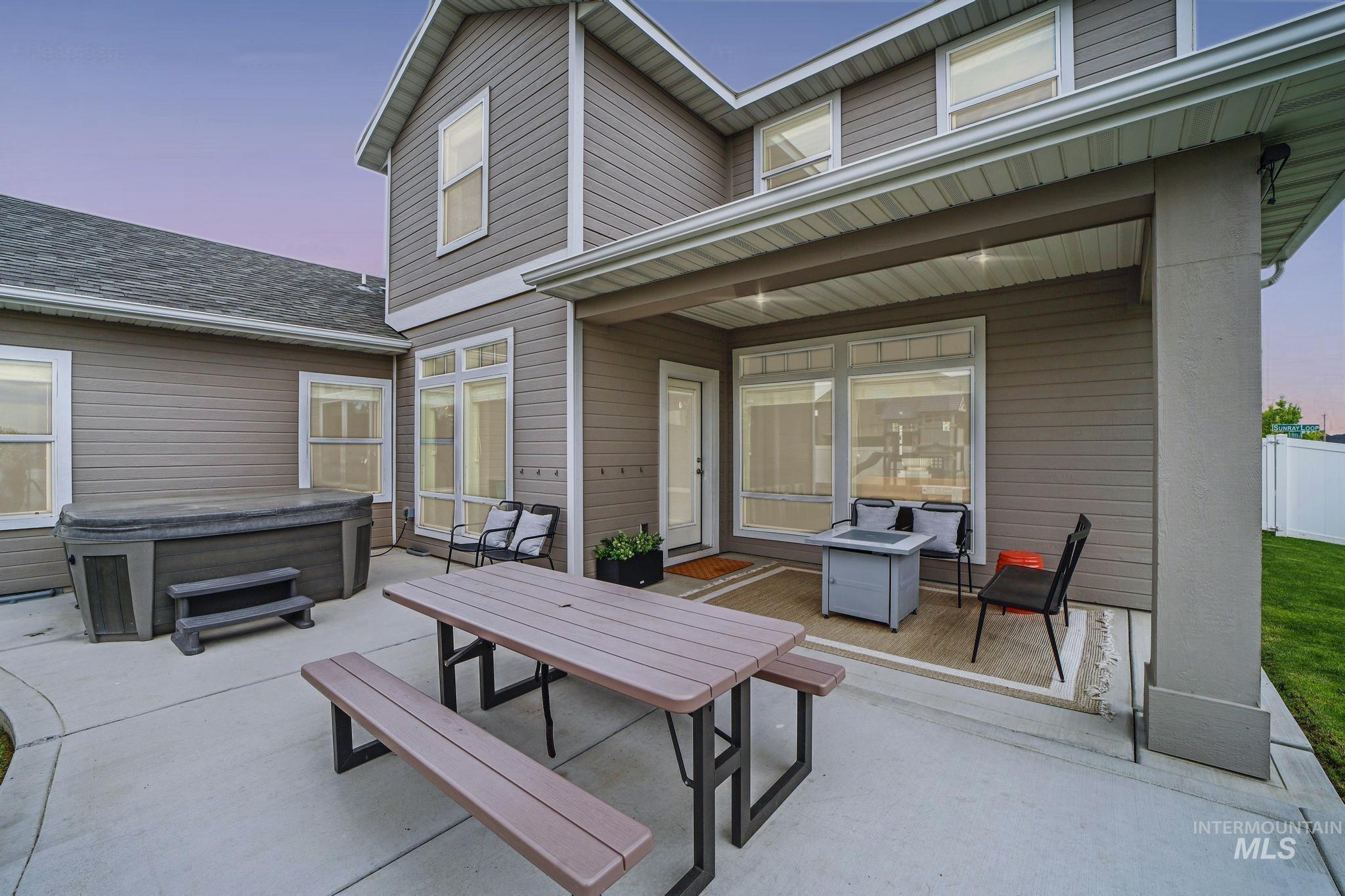 2858 Sunray Loop Twin Falls, ID 83301 - Photo 38 of 45 View of patio / terrace with a hot tub and outdoor dining space