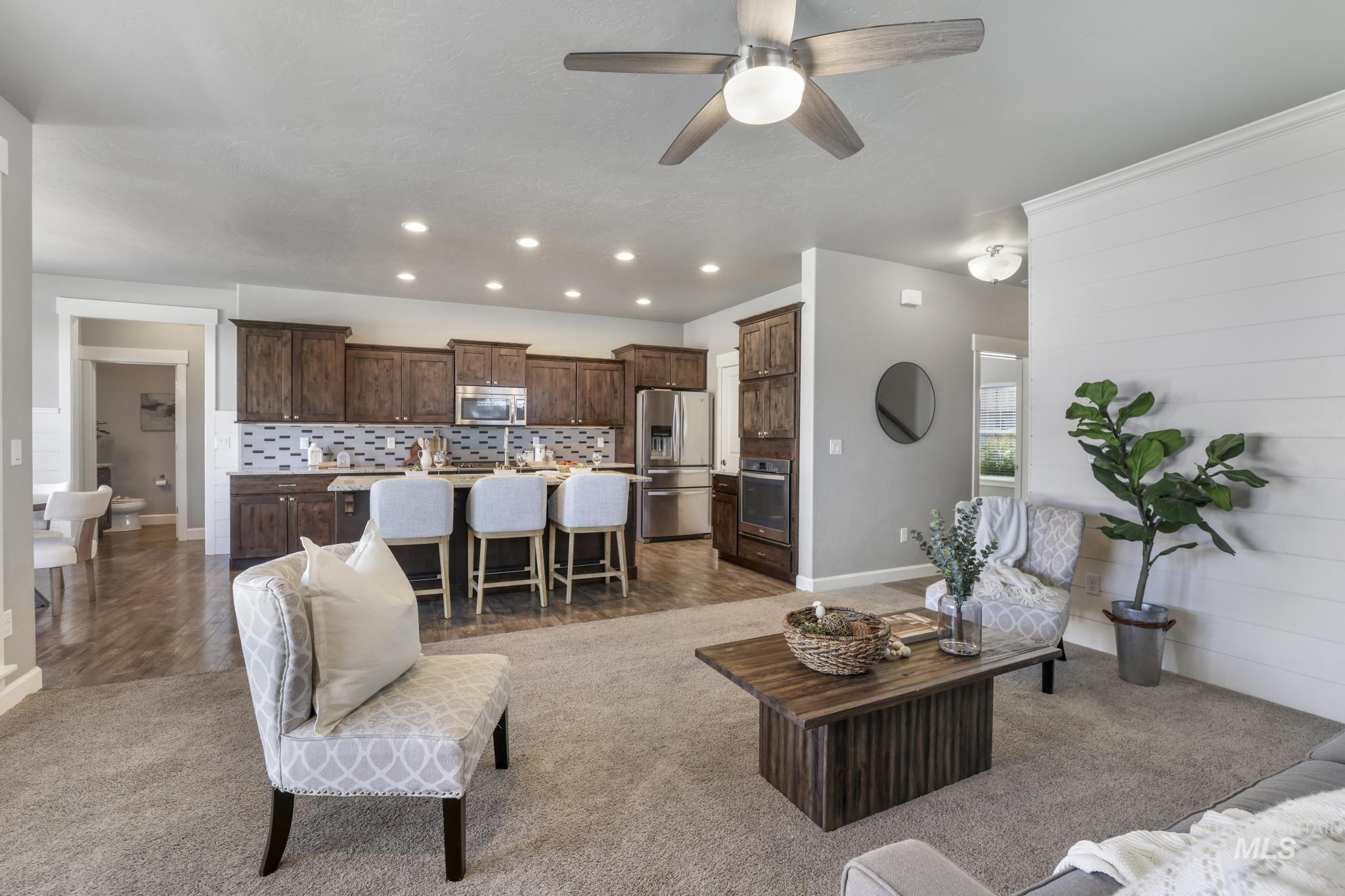 2858 Sunray Loop Twin Falls, ID 83301 - Photo 7 of 45 Living room featuring recessed lighting, ceiling fan, and light carpet