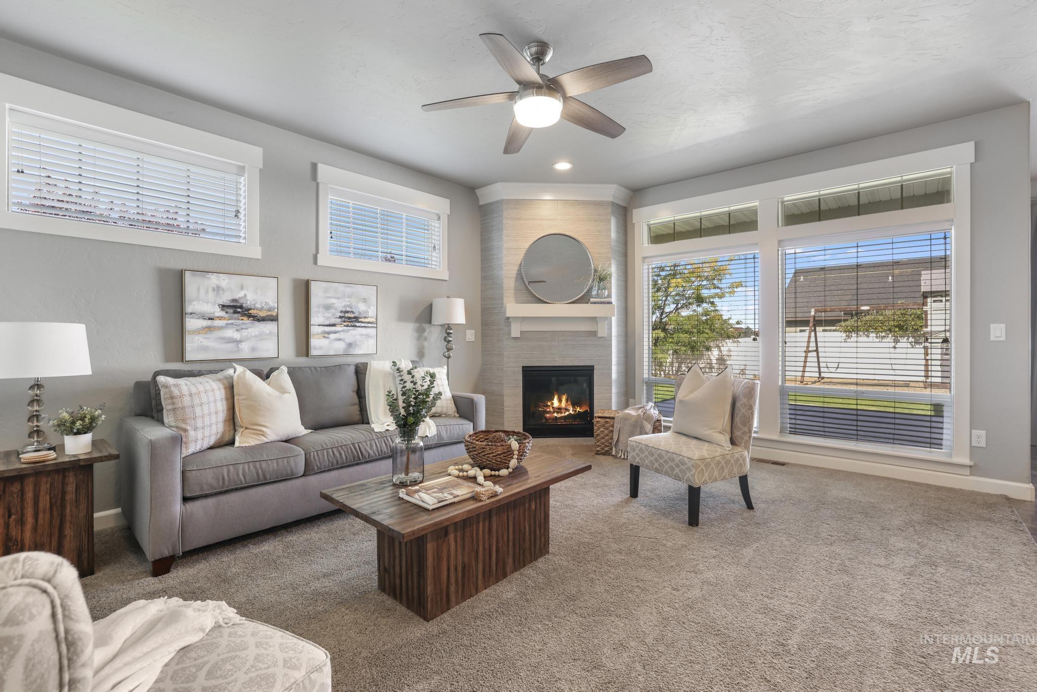 2858 Sunray Loop Twin Falls, ID 83301 - Photo 8 of 45 Living room with plenty of natural light, carpet flooring, ceiling fan, and recessed lighting
