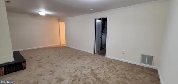 an empty room with a natural light