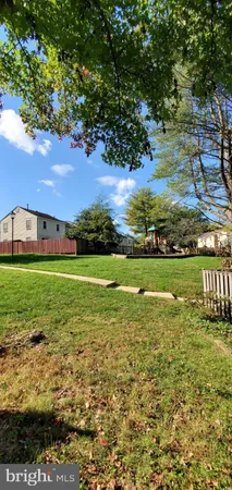 a view of a golf course with a big yard