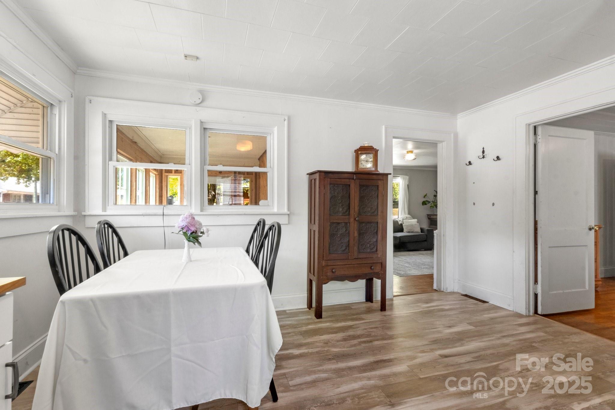 300 Cook Street Kannapolis, NC 28083 - Photo 13 of 40 a spacious bedroom with a bed and wooden floor