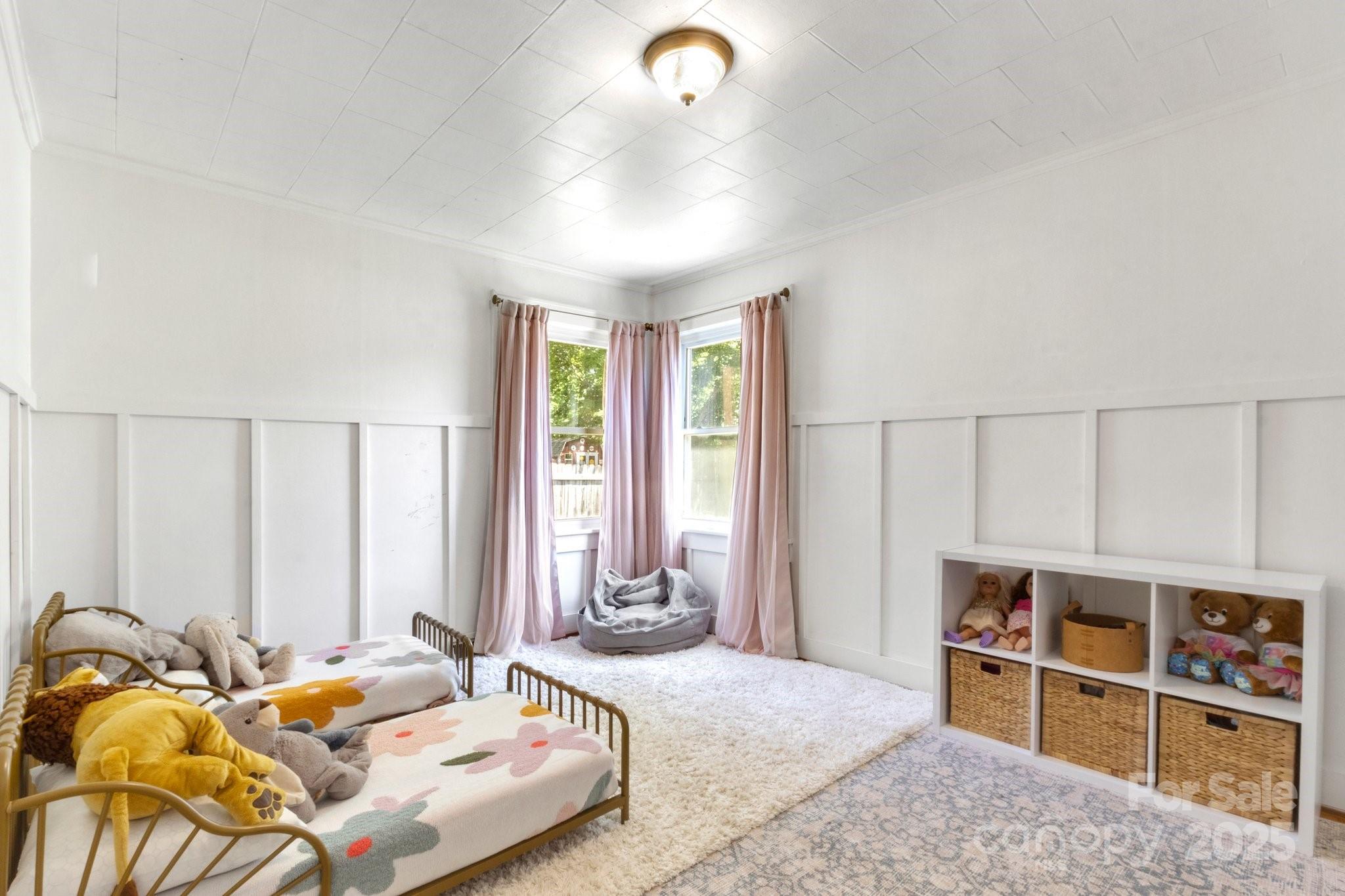 300 Cook Street Kannapolis, NC 28083 - Photo 20 of 40 a bedroom with a bed and a large window