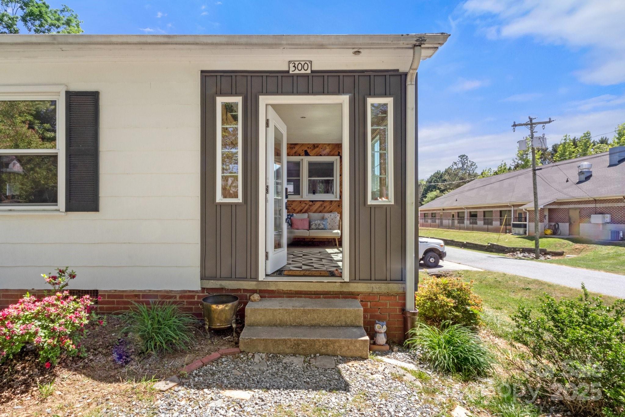 300 Cook Street Kannapolis, NC 28083 - Photo 2 of 40 a front view of a house with a yard