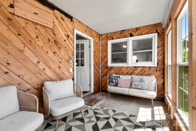 a couch sitting in front of a building