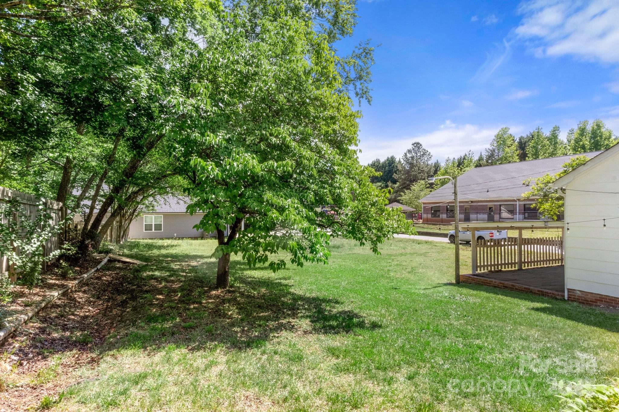 300 Cook Street Kannapolis, NC 28083 - Photo 38 of 40 a view of a house with a backyard