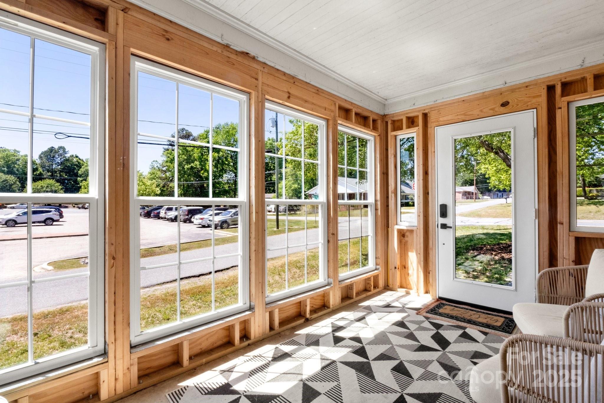300 Cook Street Kannapolis, NC 28083 - Photo 4 of 40 a bedroom with a bed and glass door